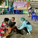 กิจกรรมรณรงค์ฉีดวัคซีนป้องกันโรคพิษสุนัขบ้า ตามโครงการสัตว์ปลอดโรค คนปลอดภัยจากโรคพิษสุนัขบ้า